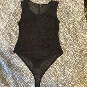 Black mesh body suit